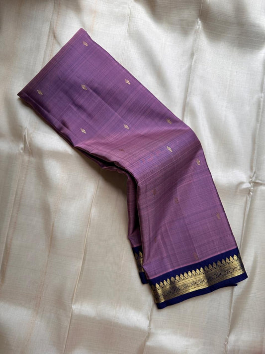 Anuragini: Lilac Mist Pure Silk Kanchipuram Saree with Dainty Gold Buttas
Deep Navy Contrast Temple Borders & grid  Zari  Pallu, Silk Mark Certified ✅
Free Shipping within USA | Ships in Two Weeks 🇺🇸
