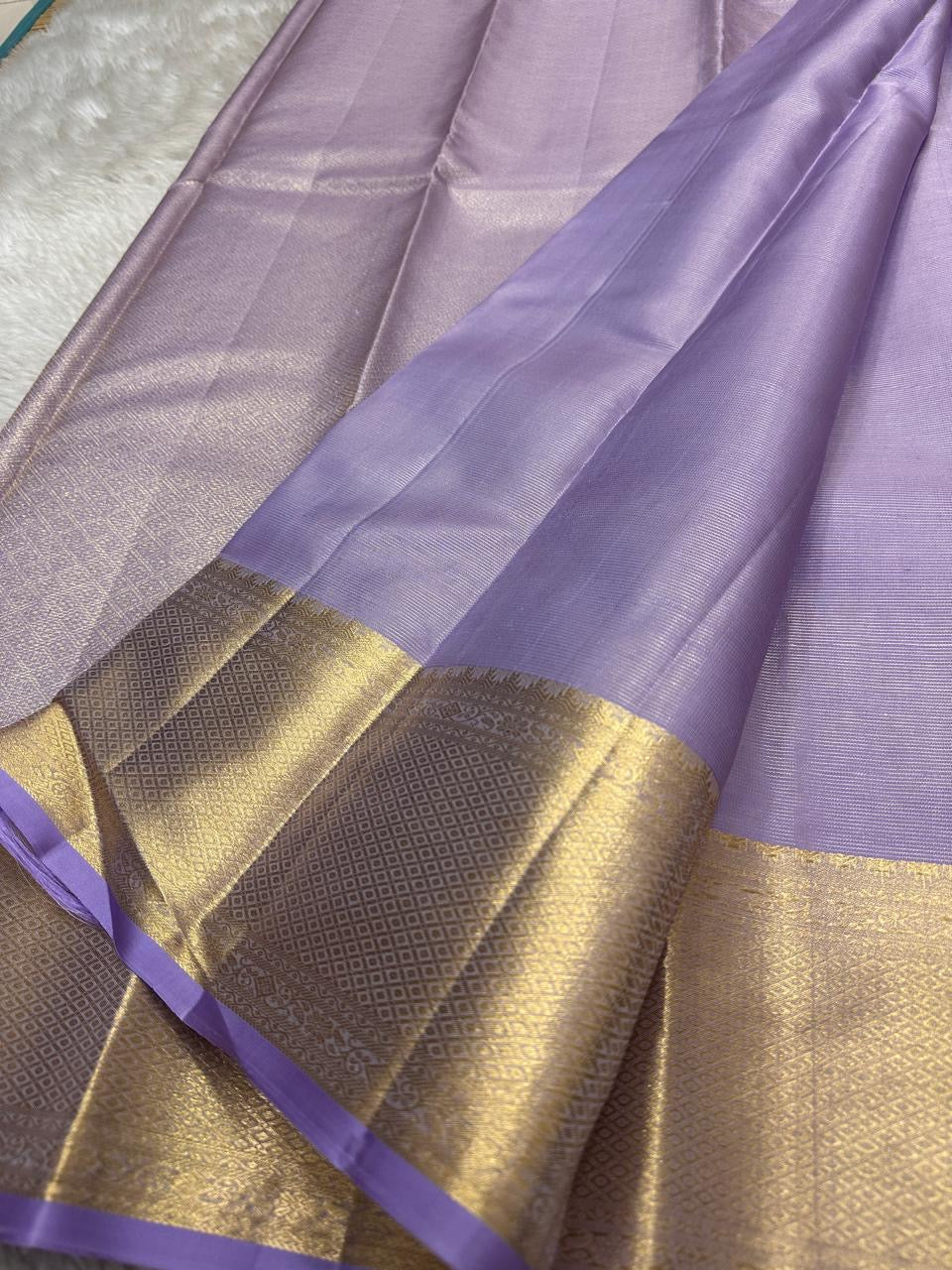 ✨ Lilac Vairaoosi — Pure Silk Kanchipuram Saree ✨
Pastel lilac body with vairaoosi pin-stripes and self-zari buttas, finished with antique-gold brocade borders and matching pallu.
Silk Mark Certified ✅ • Free Shipping within USA 🇺🇸 • Ships in 1 Week ✅