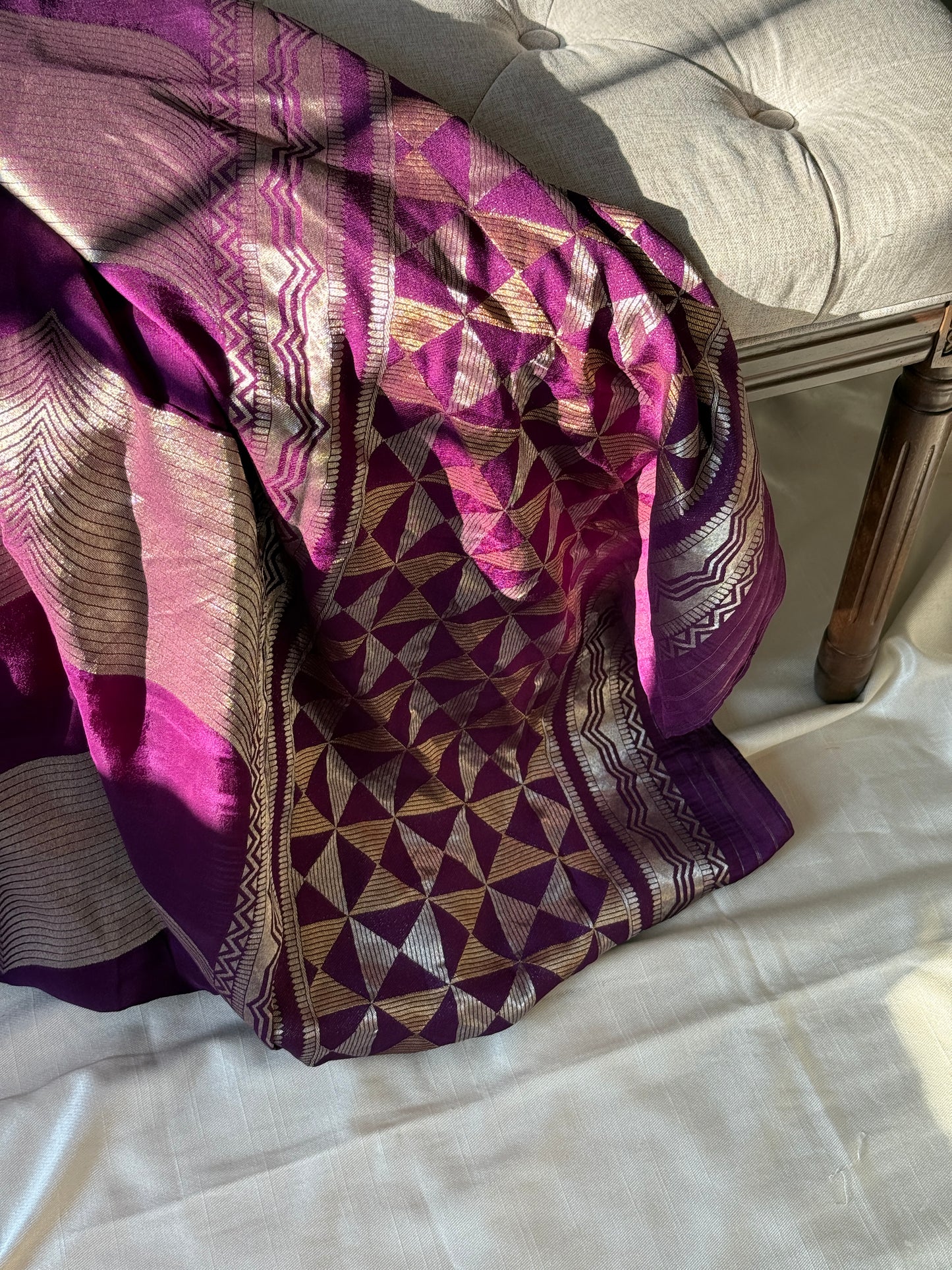 Purple Semi-Georgette Banarasi Saree 💜
Gold Zari Floral Jaal & Striped Weave ✨
Broad Contrast Border with Rich Detailing 💫
Lightweight, Festive & Elegant Draping 🌸
Silk Mark Certified | Ships in 2 Weeks | Free USA Shipping ✅