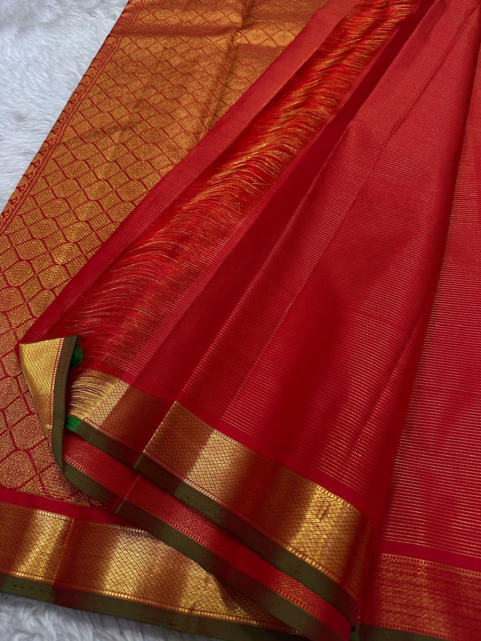 Red Glimmering Deer Vairaoosi — Pure Silk Kanchipuram Saree
Kumkum red vairaoosi with antique-gold deer buttas & kaddi zari border.
Silk Mark Certified · Free USA Shipping · Ships in 2 Weeks ✨