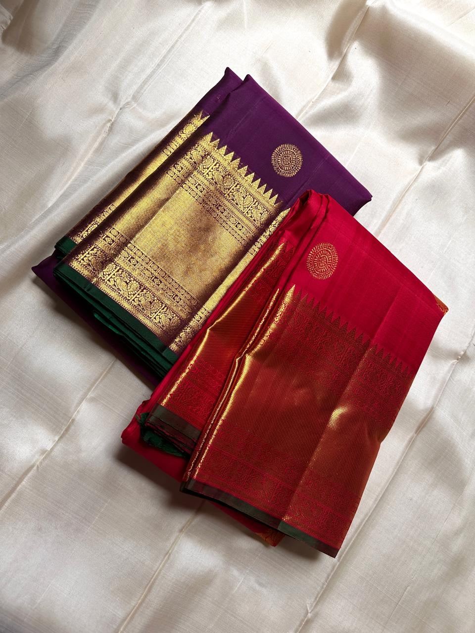 A majestic union of deep purple silk and emerald grace! Mayil chakram butta peacock border