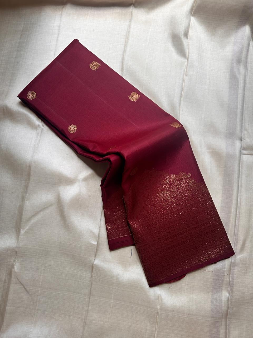 Lotus Glow — Brown | Pure Kanchipuram Silk Saree
A regal brown-maroon canvas adorned with gold zari peacocks, elephants & lotus buttas ✨
Silk Mark Certified • Free USA Shipping • Ships in Two Weeks