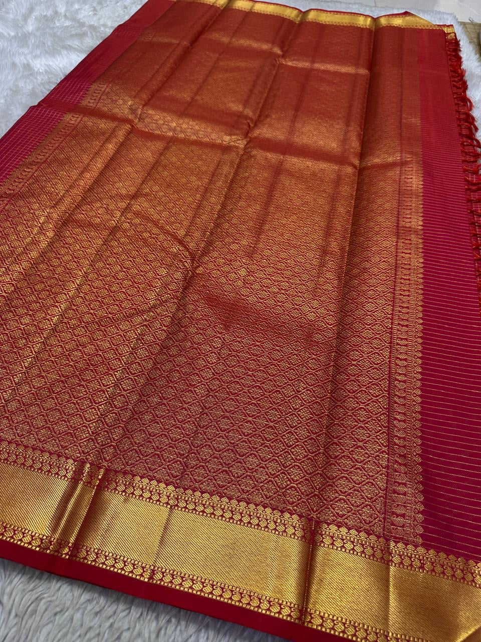 Madhuvanam Vermillion Red – Pure Silk Kanchipuram Saree
Rich vermillion red kattam checks with lustrous gold zari borders and brocaded pallu ✨
Silk Mark Certified • Ships in Two Weeks • Free Shipping within USA 🎁