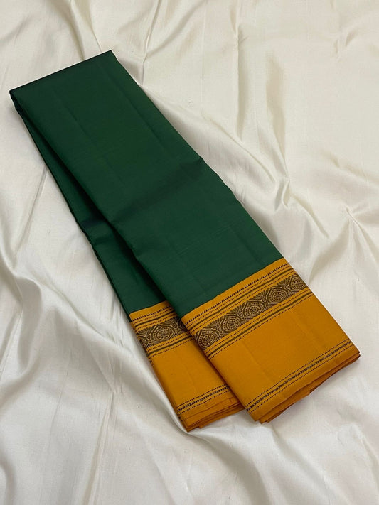 Maragatham & Mustard — Pure Silk Kanchipuram Saree
Emerald-green body with mustard korvai borders & floral medallion vines, varisaipettu pallu with tassels.
Silk Mark Certified • Ships in Two Weeks • Free USA Shipping ✅