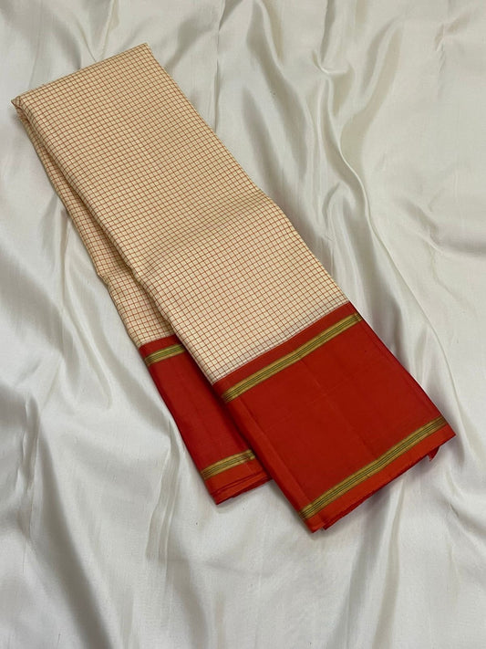 Ivory Vermillion Kattam — Pure Silk Kanchipuram Saree
Buttermilk-Ivory Body with Red Micro-Checks & Vermilion Korvai Border ✨
Gold Pin Lines, Leaf-Green Highlights & Rust Pallu • Silk Mark Certified • Ships in 1 Week ✅