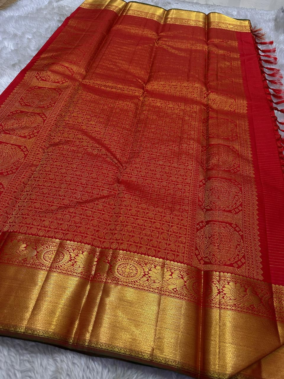 Ravi Kiranam Red Zari Kattam | Pure Silk Kanchipuram
Fiery Kumkum-Red • zari  Checks & Zari Buttas
Grand Gold Zari Border • Brocade Pallu with Ornamental Medallions
Silk Mark Certified • Free Shipping within USA
Ships in Two Weeks | Blouse Stitc