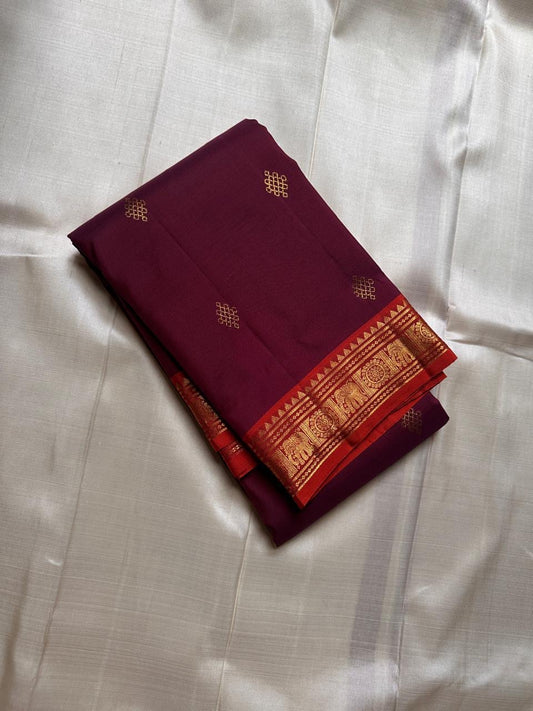 Maroon Kolam Korvai – deep wine-maroon body with tiny kolam buttas
Contrast burnt-orange korvai border with temple triangles & intricate kolam motifs
Silk Mark Certified | Fall & Pico Done | Blouse Stitching Available ($30)
Free Shipping 2 weeks