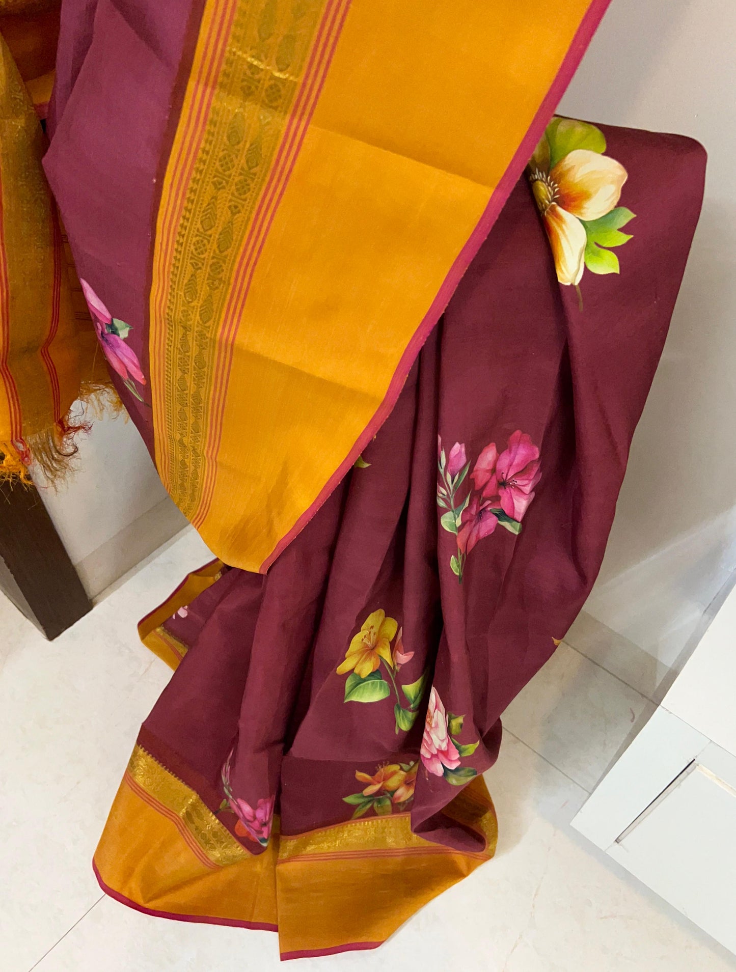 Mandaram – One-of-a-Kind Deep Brown Pure Kanchipuram Silk Saree with Golden Mustard Zari Fish Motifs, Monsoon Hibiscus Floral Print & Striking Red Selvedge (Silk Mark Certified, Woven in Sunguvar Sathiram( Kanchi) Printed in Delhi)