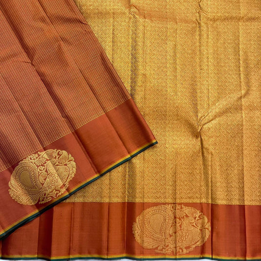 Rust Sorgavasal Mayil – Podi Kattam Pure Kanchipuram Silk Saree
Rust micro-checks with gold sorgavasal peacock chakram border
Brocade gold pallu & running blouse with border
Silk Mark Certified | Fall & Pico Done
Free Shipping (1week)