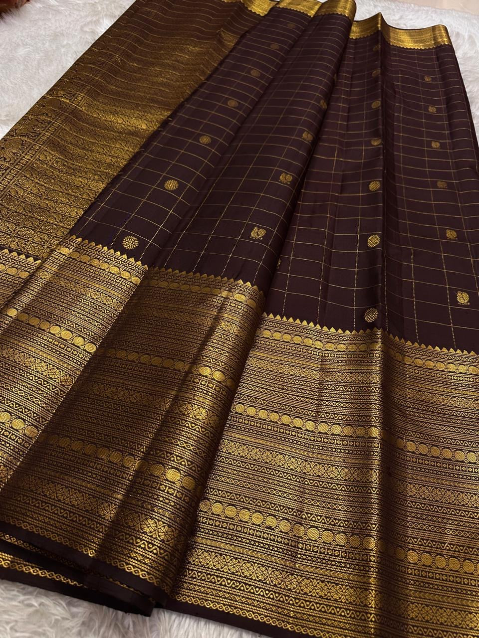 Brown Zari kattam with ornate border pure silk Kanchipuram with mayil chakram zari butta and detailed Pallu