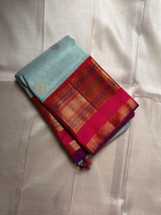Sky Blue Vairaoosi — Pure Silk Kanchipuram Saree
Rani Pink Korvai Border & Red Brocade Pallu
Silk Mark Certified • Free USA Shipping • Ships in Two Weeks