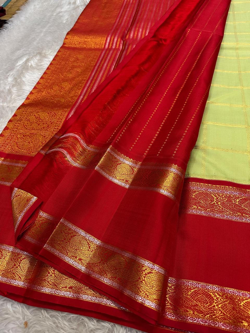 Pistachio Ganga Jamuna – Pure Kanchipuram Silk Saree
pistachio green body with zari kattam & floral buttas ✨
Ganga Jamuna borders in emerald green & vermilion red 🌿🔥
vermilion red pallu richly woven with zari, Silk Mark Certified, delivery in 2 weeks