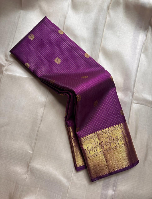 Subha Kattam — Pure Silk Kanchipuram Saree
Vadamalli purple saree with gold buttas & fine kattam checks ✨
Elephant zari borders, grand pallu, Silk Mark Certified ✅ • Free USA Shipping 🇺🇸 • Ships in 2 Weeks 🚚