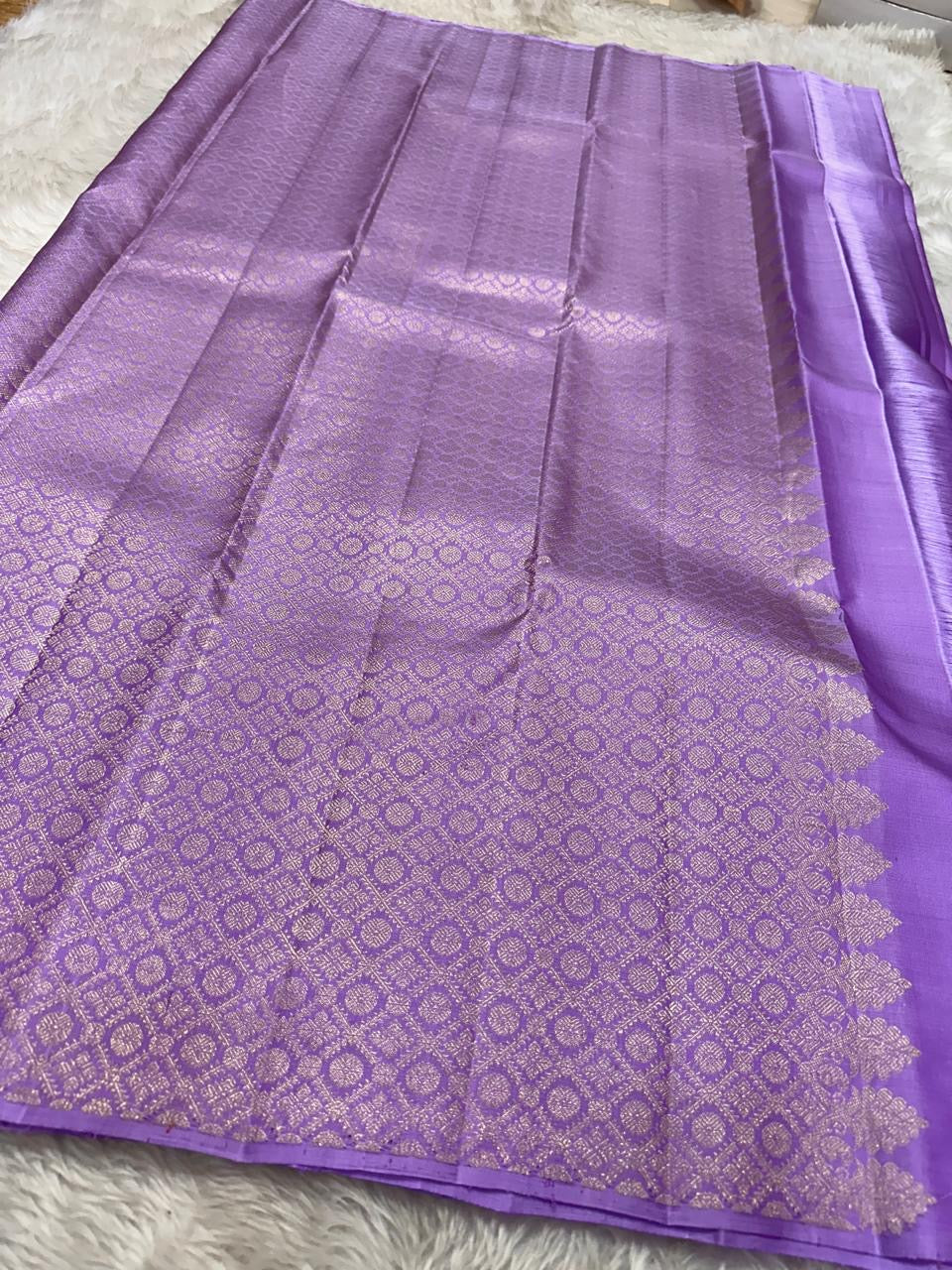 Lavender- Pure silk Kanchipuram handloom saree with contemporary gold and silver Zari leaf motifs on border and Pallu