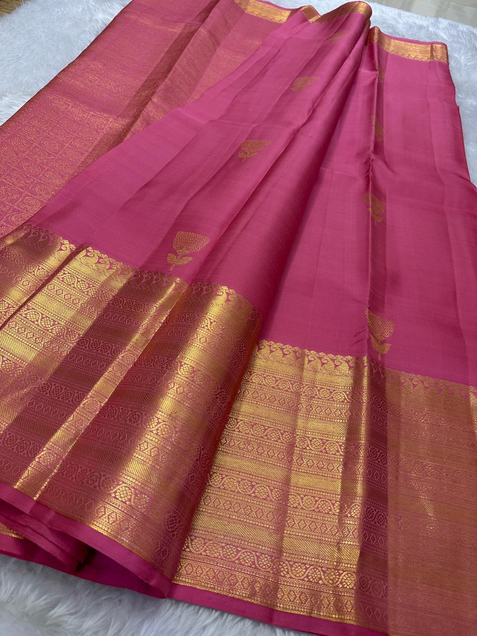 Pretty pink adukkupet pure silk kanjivaram with the Zari Mogra motif inspired by banarasi silks, chakram and mayil grid border