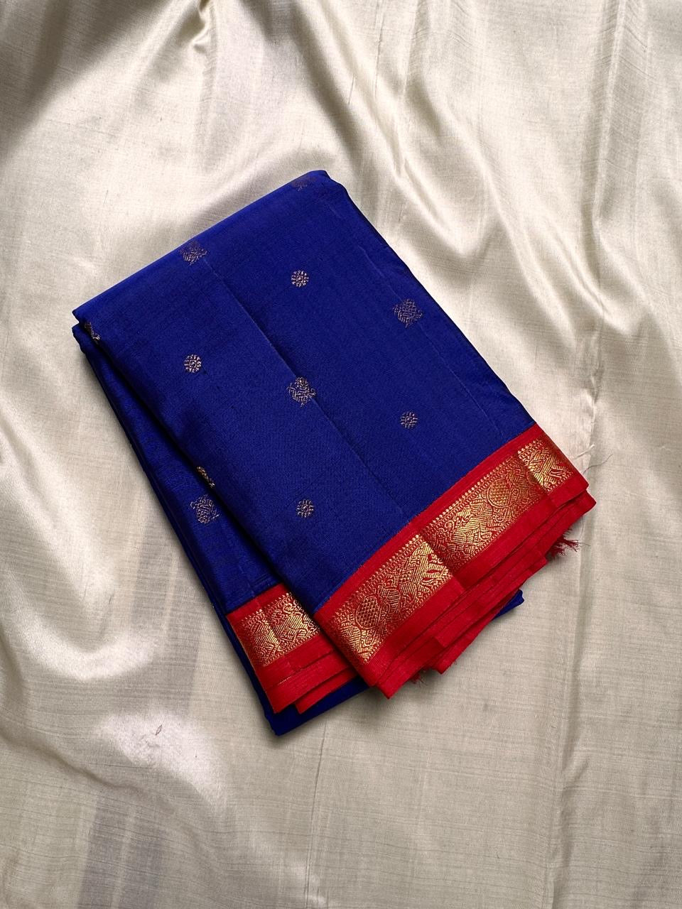 Pure silk Zari kattam butta pink and red saree with peacock, kamalam and kolam motifs