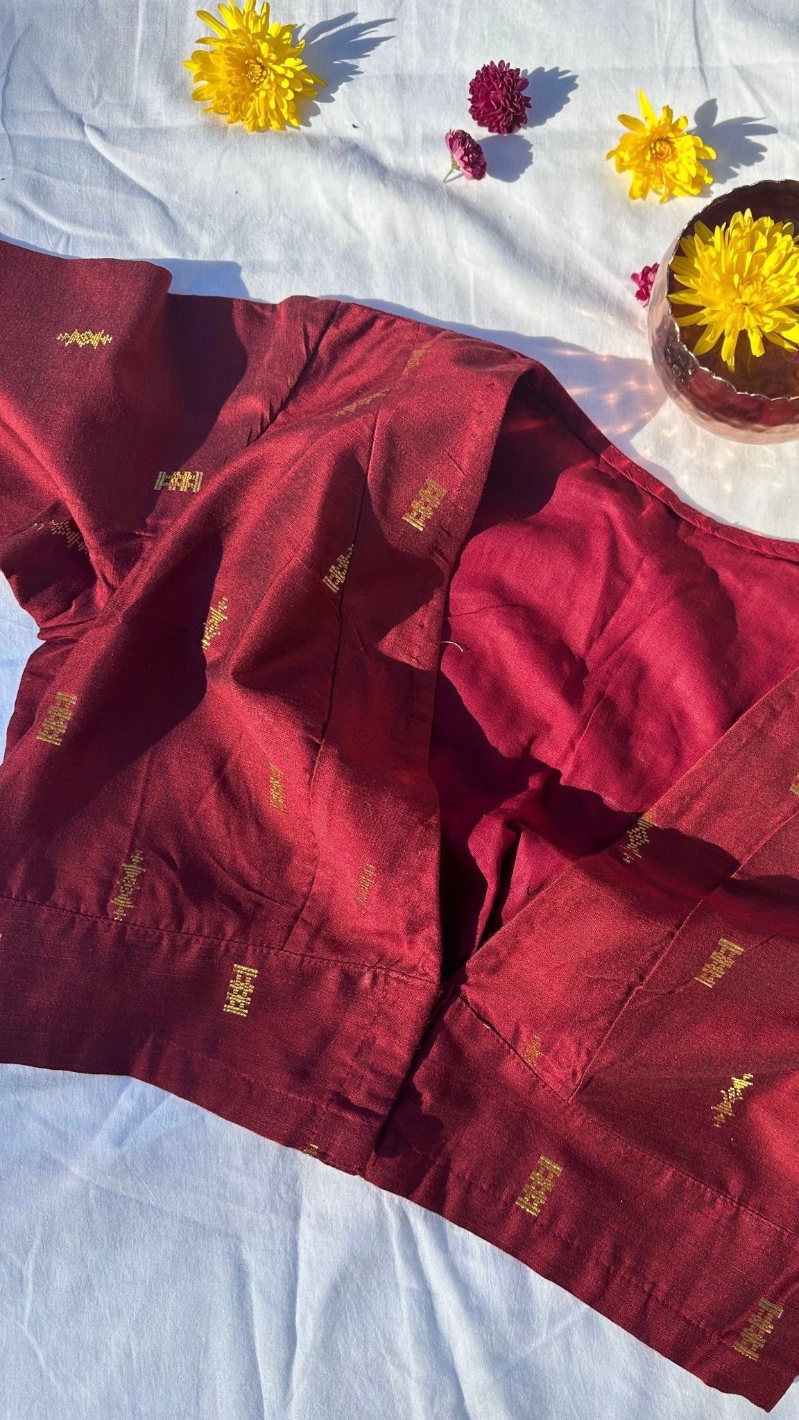 Red silk cotton butta motif blouse front view with structured neckline