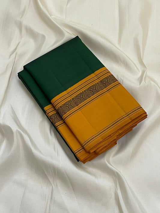 Maragatham & Mustard — Pure Silk Kanchipuram Saree
Emerald-green body with mustard korvai borders & floral medallion vines, varisaipettu pallu with tassels.
Silk Mark Certified • Ships in Two Weeks • Free USA Shipping ✅