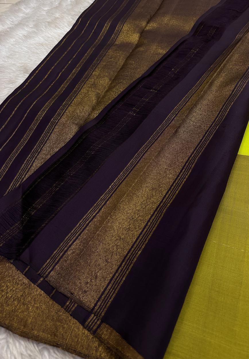 🌿 Venn Pachai – Deep Violet Checks & Lime Korvai Kanchipuram 🌿
✨ Pure Silk | Silk Mark Cert | Handloom Kanjivaram ✨
🪔 Violet & Gold Checks with Rich Zari Pallū | Bright Lime Green Body
🌸 Korvai | woven  Zari Buttas
Gandaberunda
🚚 Ships in 2weeks
