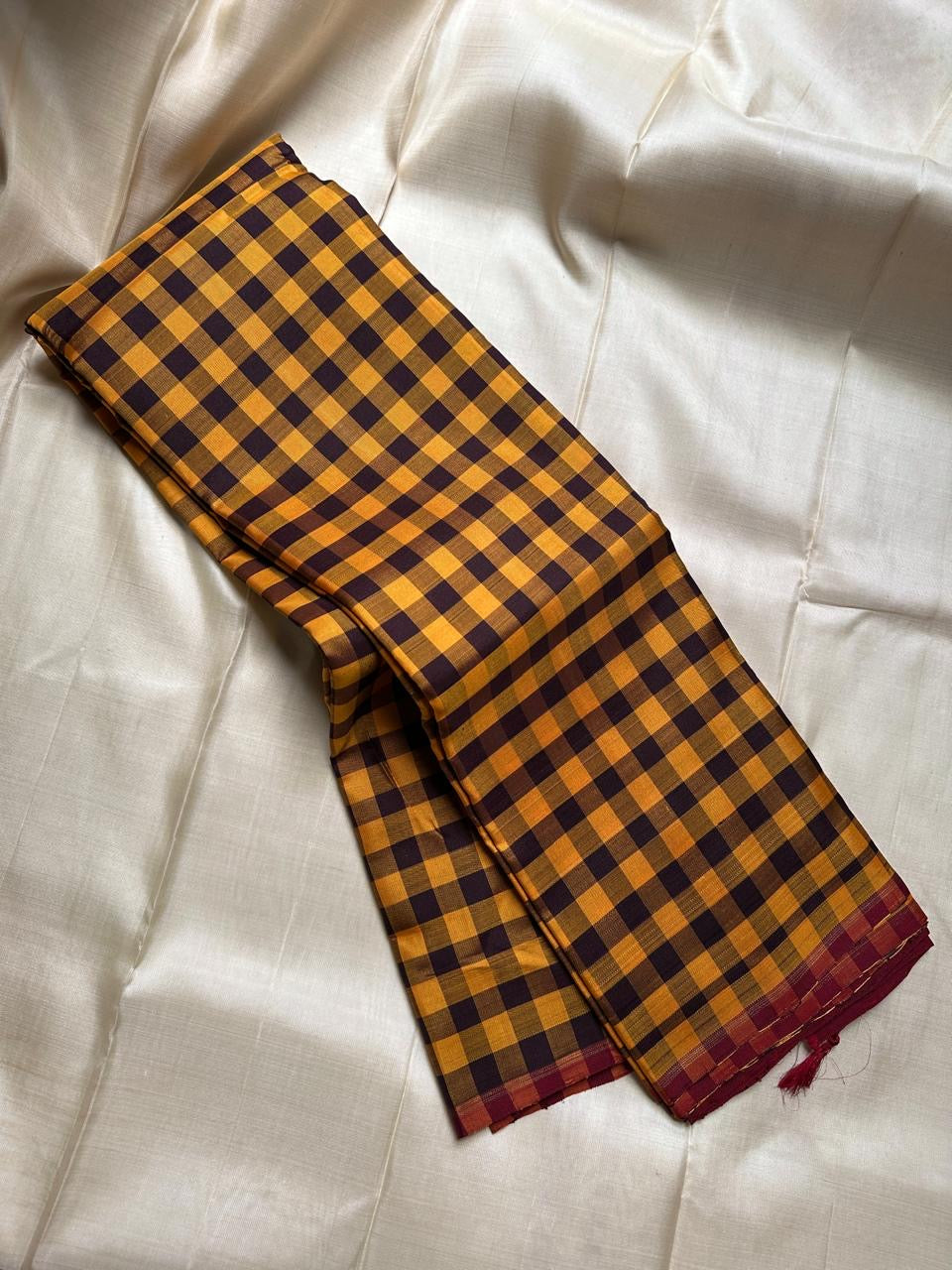 Kanchi kattam mustard and brown checked saree with deep maroon Pallu, Kai korvai