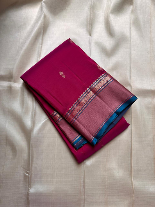 Pink Lily — Pure Silk Kanchipuram
Rani-pink body with zari buttas, dusty-mauve korvai borders & teal selvedge highlights ✨
Silk Mark Certified • Antique Zari Weave • Ships in Two Weeks • Free Shipping within USA
