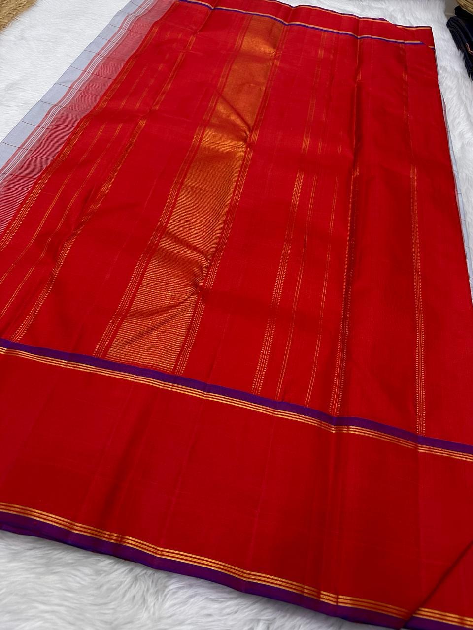 Tazhampoo 🌸 – Blue Kanchipuram Pure Silk Saree
Thazampoo Reku in Bright Orange-Red Border
Purple Selvedge for Vibrant Contrast
Handwoven in Our Family Village, Kanchipuram
Silk Mark Certified | Blouse fabric Included |stitching Available