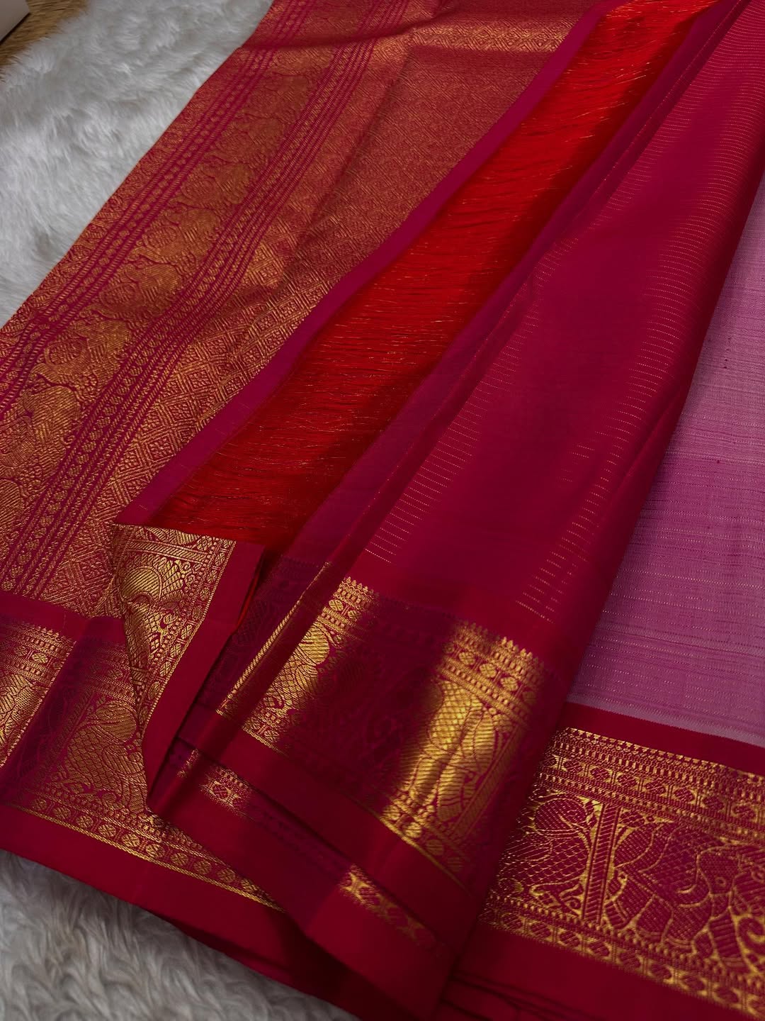 Banu – Off-White Kanchipuram Pure Silk Saree with pure 3gm Zari Kattam & Deep Red-Pink Shot color Border with elegant and peacock motifs