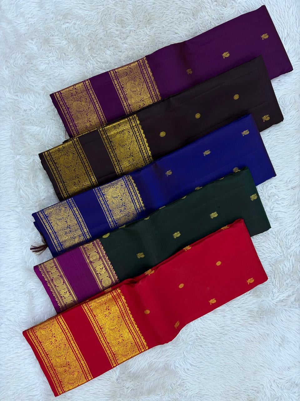 Royal Indigo and Antique Gold Handwoven Pure Silk Kanjeevaram Saree with Rettapet Border and Mayil Chakram Butta