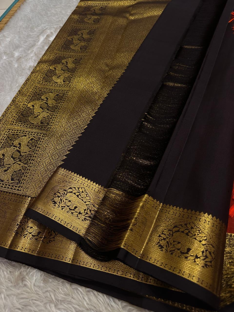 Tamra — Rust Vairaoosi Kanchipuram Pure Silk
 
Coffee Brown Korvai Border & zAri Pallu
 
elephant motifs  Medallions & Annam Panels in Gold Zari
 
Silk Mark Certified | Free Shipping within USA
 
Ships in Two Weeks | Blouse Stitching $30