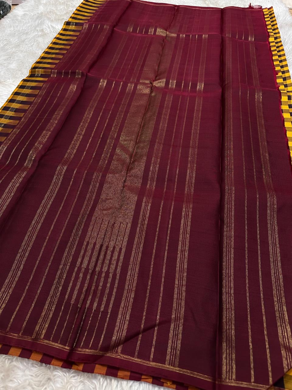 Kanchi kattam mustard and brown checked saree with deep maroon Pallu, Kai korvai