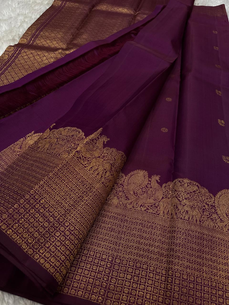 Lotus Glow — Pure Kanchipuram Silk Saree
Deep amethyst-purple with lotus buttas, peacock & elephant zari border
Silk Mark Certified ✅ | Free USA Shipping | Ships in Two Weeks ✅