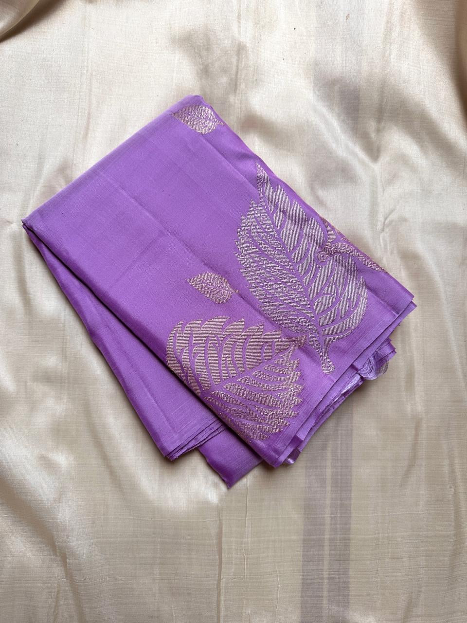 Lavender- Pure silk Kanchipuram handloom saree with contemporary gold and silver Zari leaf motifs on border and Pallu