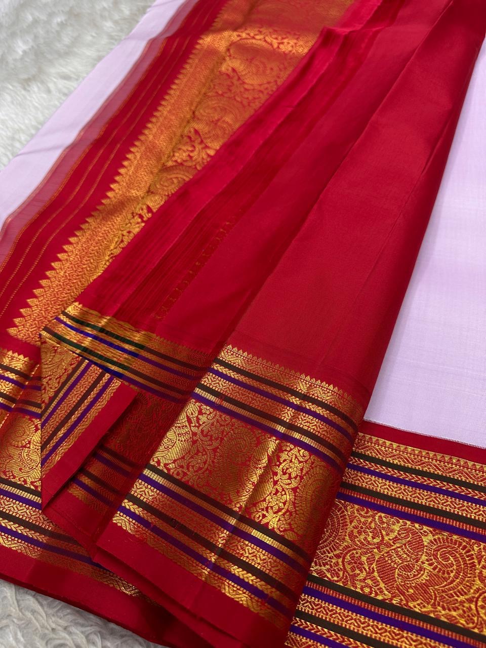 Lilac Sitare — Pure Silk Kanchipuram Saree
Pastel Lilac Body with Gold Sitare Buttas & Rani-Red Korvai Border ✨
Silk Mark Certified • Fall & Pico Done • Free USA Shipping • Ships in Two Weeks ✅
