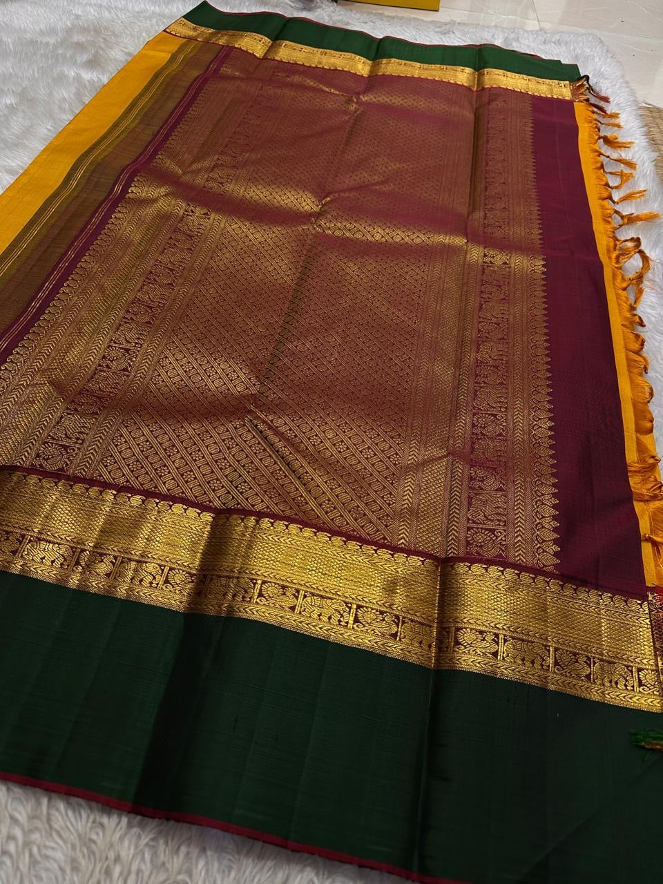 ✨ Deepa Layam — Pure Silk Kanchipuram Saree (Korvai)
Manjal-marigold body with gold paisley buttas & emerald korvai borders
Silk Mark Certified ✅ • Ships in Two Weeks • Free Shipping within USA 🇺🇸