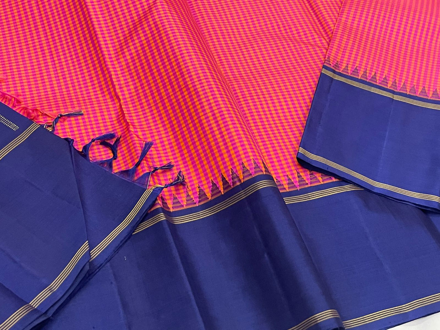 Peony Indigo Kattam — Pure Silk Kanchipuram Saree
Peony-Pink & Kesari Micro Checks with Deep Indigo Korvai Border ✨
Silk Mark Certified • Free USA Shipping • ships in two weeks ✅