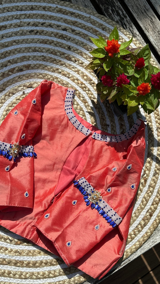 Coral raw silk blouse with emerald bead work close view of embroidery