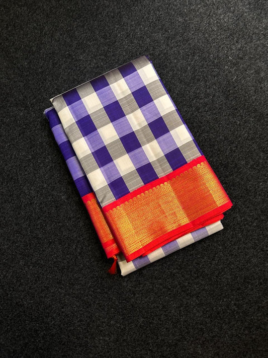 ✨ Varnika Checks — Pure Silk Kanchipuram Saree (Kattam)
Indigo–lavender–ivory checks with roja-red zari borders & rani contrast pallu
Silk Mark Certified ✅ • Ships in Two Weeks • Free Shipping within USA 🇺🇸