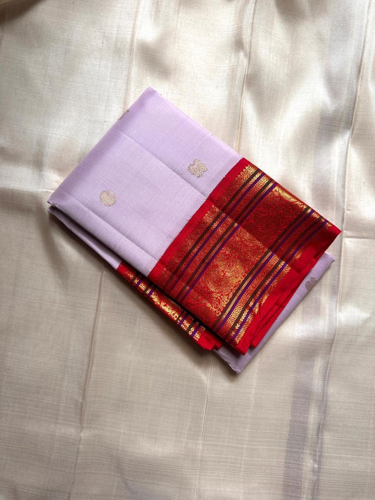 Lilac Sitare — Pure Silk Kanchipuram Saree
Pastel Lilac Body with Gold Sitare Buttas & Rani-Red Korvai Border ✨
Silk Mark Certified • Fall & Pico Done • Free USA Shipping • Ships in Two Weeks ✅