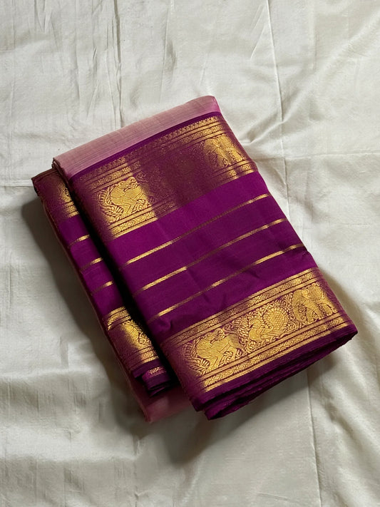 Swarna Sugantham — Pure Silk Kanchipuram Saree
Ombre rose-to-blush pink body with zari paisley buttas and rich rani-magenta borders in gold vine motifs.
Silk Mark Certified • Blouse Stitching Available ($30) • Free USA Shipping • Ships in Two Weeks.