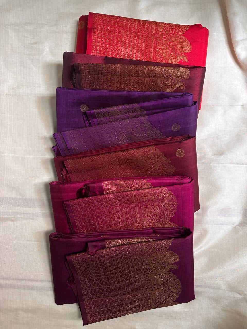 Lotus Glow — Violet | Pure Kanchipuram Silk Saree
A royal violet canvas with antique-gold zari peacocks, elephants & lotus motifs ✨
Silk Mark Certified • Free USA Shipping • Ships in Two Weeks