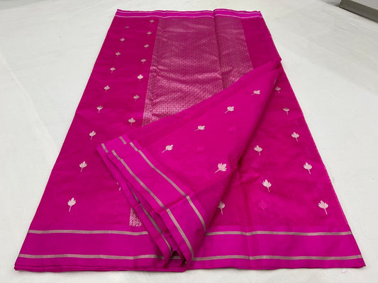 Raspberry Pink Chanderi saree styled with tonal blouse showing lotus motifs and metallic pallu