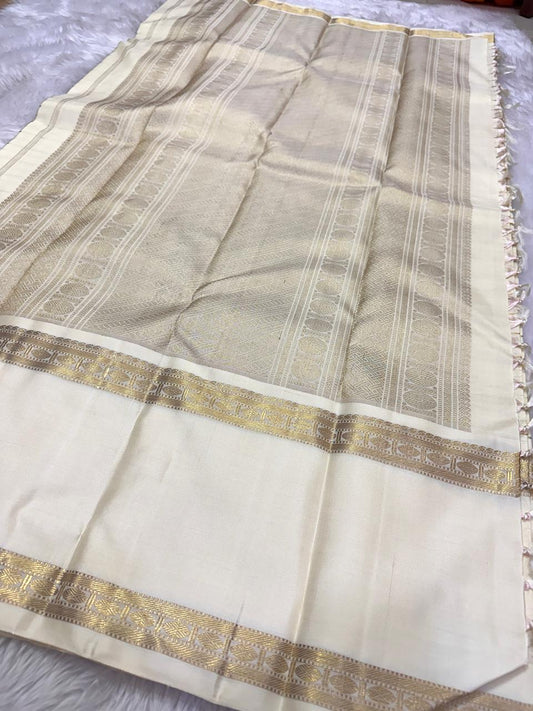 Swarna Kattam — Pure Silk Kanchipuram Saree
Ivory–gold body with zari kattam checks & rich pallu ✨
Silk Mark Certified • Ships in Two Weeks • Free Shipping within USA