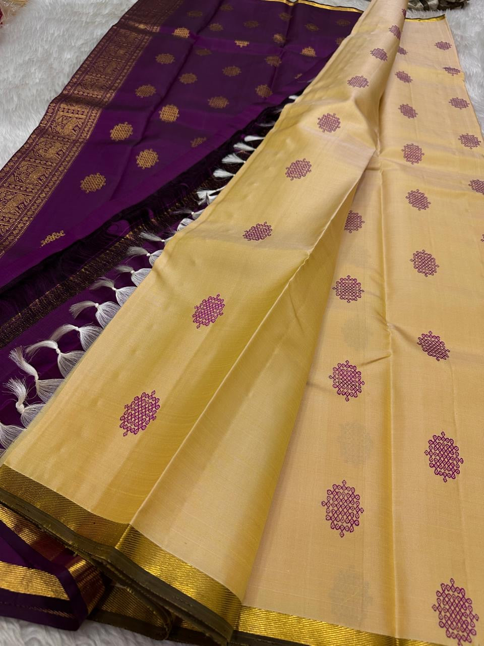 Half white cream purple selvedge and border with overall kolam woven motif in pure silk Kanchipuram saree