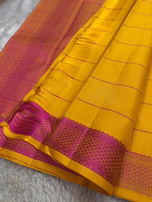 Marigold Pink Silk Thread — Pure Kanchipuram Silk
All-thread weave in marigold yellow with magenta kattam checks & buttas
Pink–orange zari woven pallu • Silk Mark Certified • Free Shipping USA