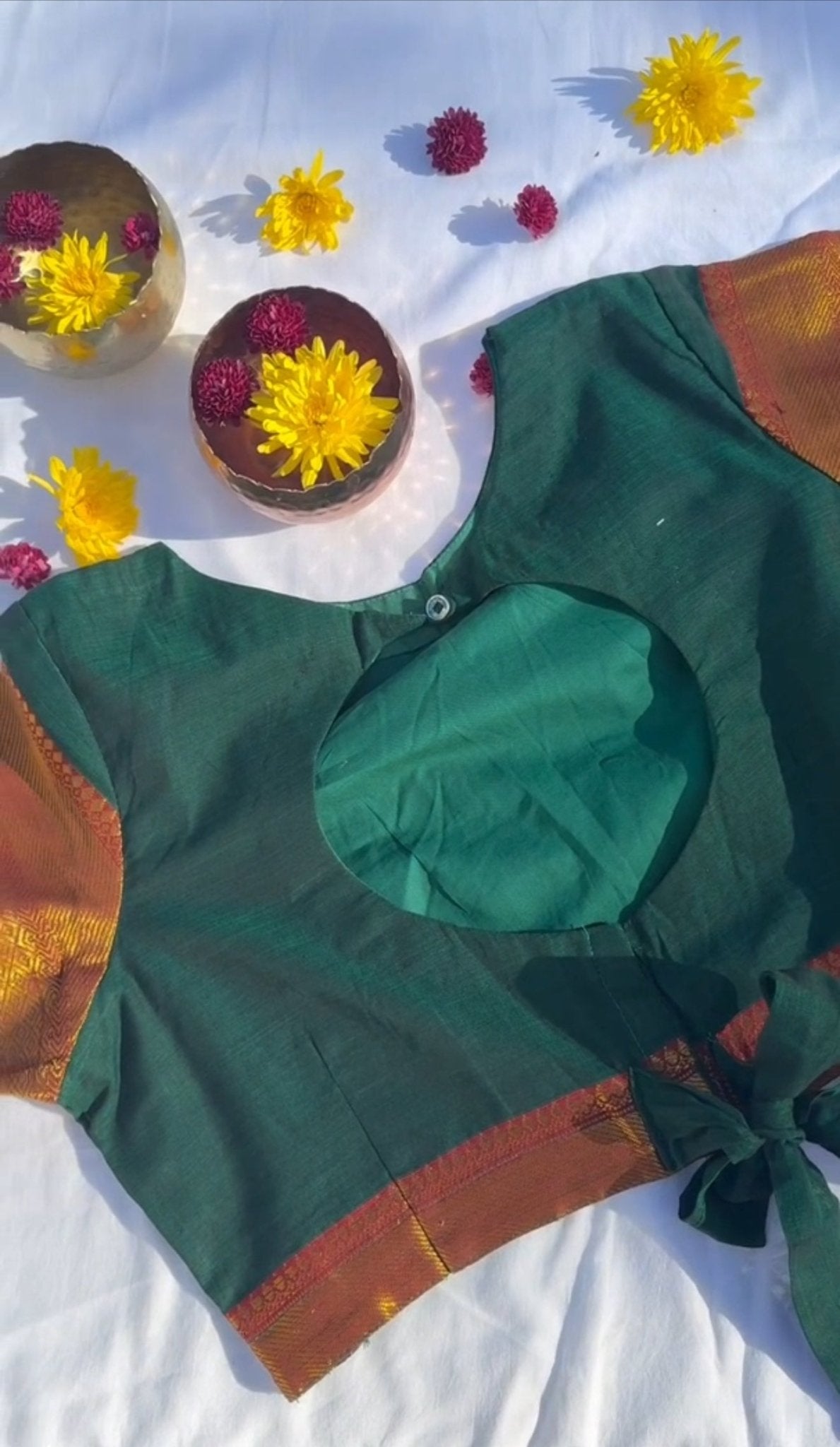 Emerald green Narayanpet blouse front view showing zari border and cotton fabric
