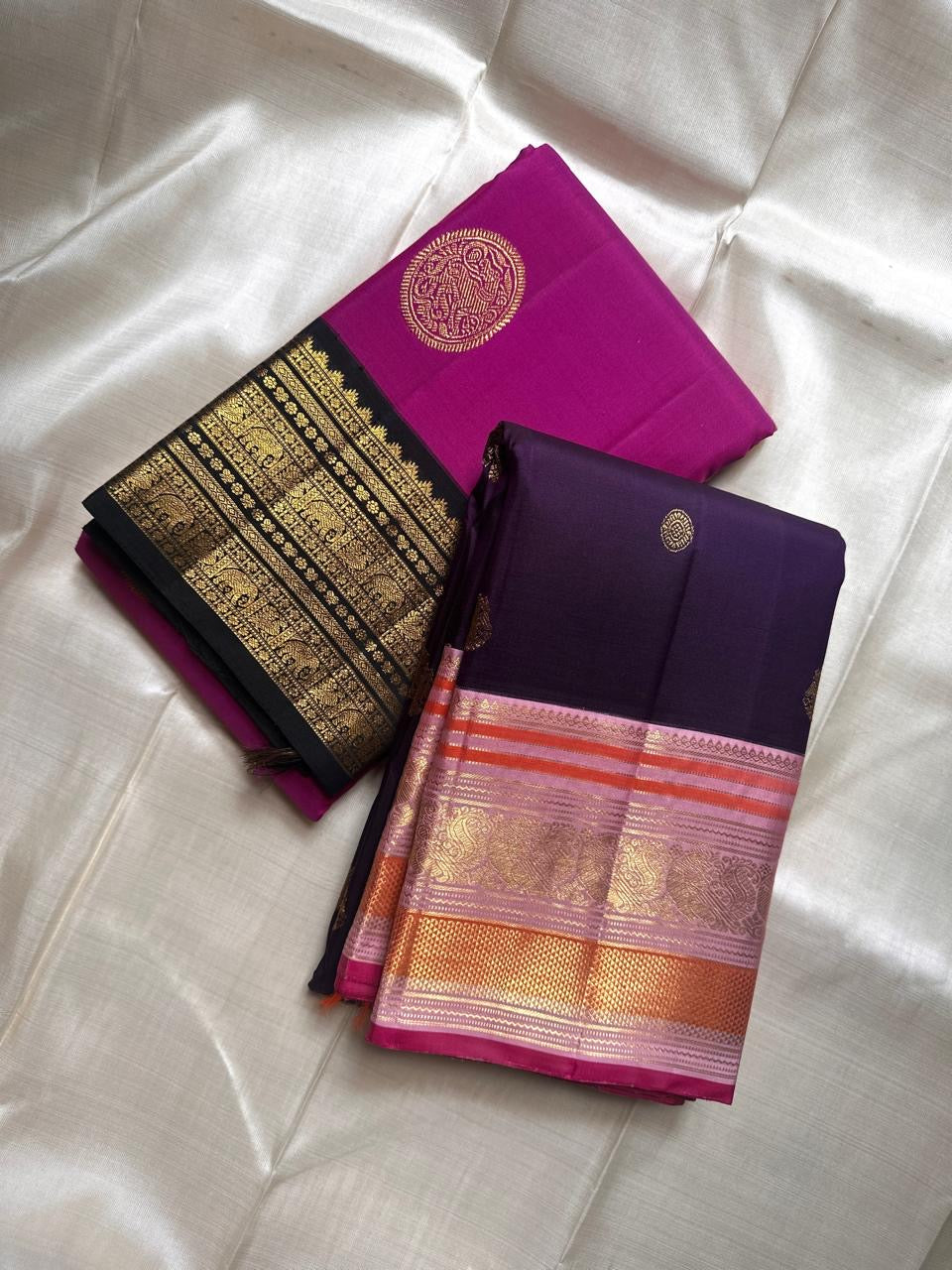 Menaka ✨ Draped in vibrant purple , its body shines with golden Yazhi motifs enshrined in Sorgavaasal arches. The contrasting black Korvai border, alive with elephants, vines, and temple motifs in zari and lavish Pallu , silk mark certified ❤️