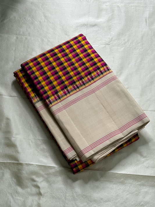 Venpattu Kattam Thazampoo Reku — Pure Kanchipuram Silk Saree
Multicolor kattam body: rani pink • manjal yellow • ink blue/black • deep purple/green accents
(venpattu) borders with pink selvedge lines & thazampoo reku 
Silk Mark Certified  free shipping