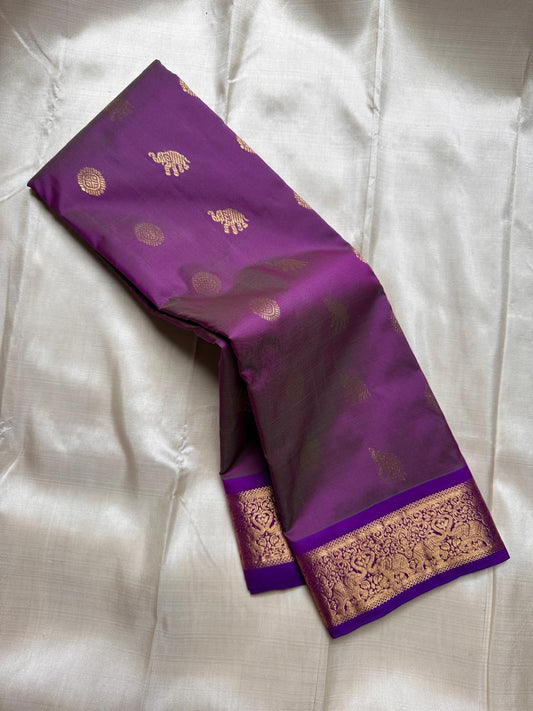 Swaram “Blossoming Plum”
Lightweight Pure Kanchipuram Silk Saree
Elephant Parade Zari-Woven Borders in Antique Gold