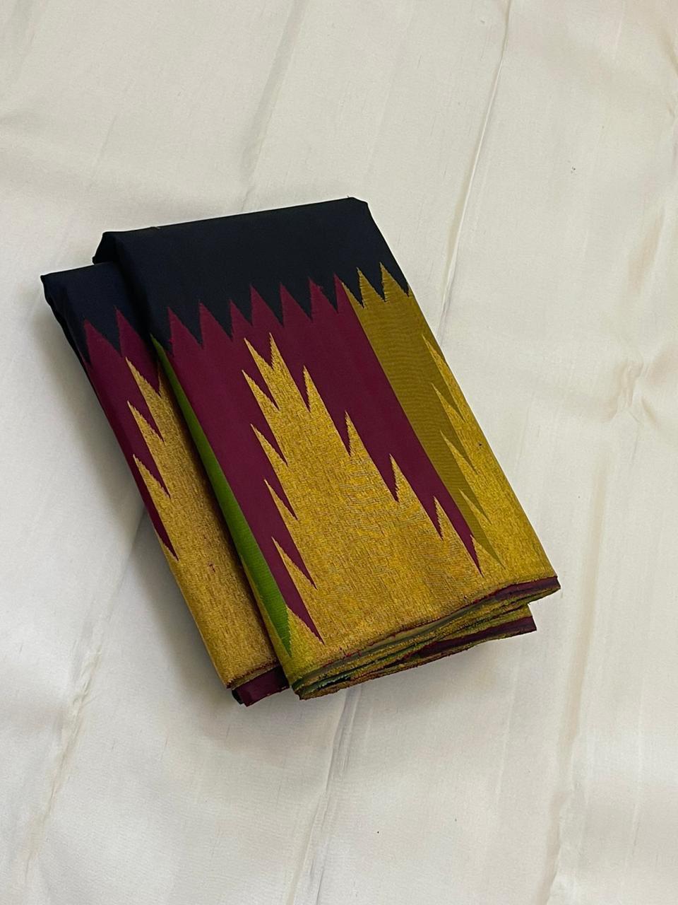 Ettukol Karuppu — Pure Silk Kanchipuram
Inky-black body with parrot-green & mustard buttas, korvai temple peaks in gold, wine & green ✨
Silk Mark Certified • Ships in Two Weeks • Free Shipping within USA