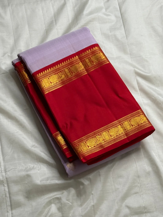 Lilac Raspberry — Pure Silk Kanchipuram Saree
Soft Lilac Body with Gold Floral Buttas ✨
Contrast Raspberry Red Borders with Temple Zari Edging
Rich Brocade Pallu in Gold & Red Grandeur
Silk Mark Certified ✅ | Free USA Shipping 🇺🇸 | Ships in Two Weeks
